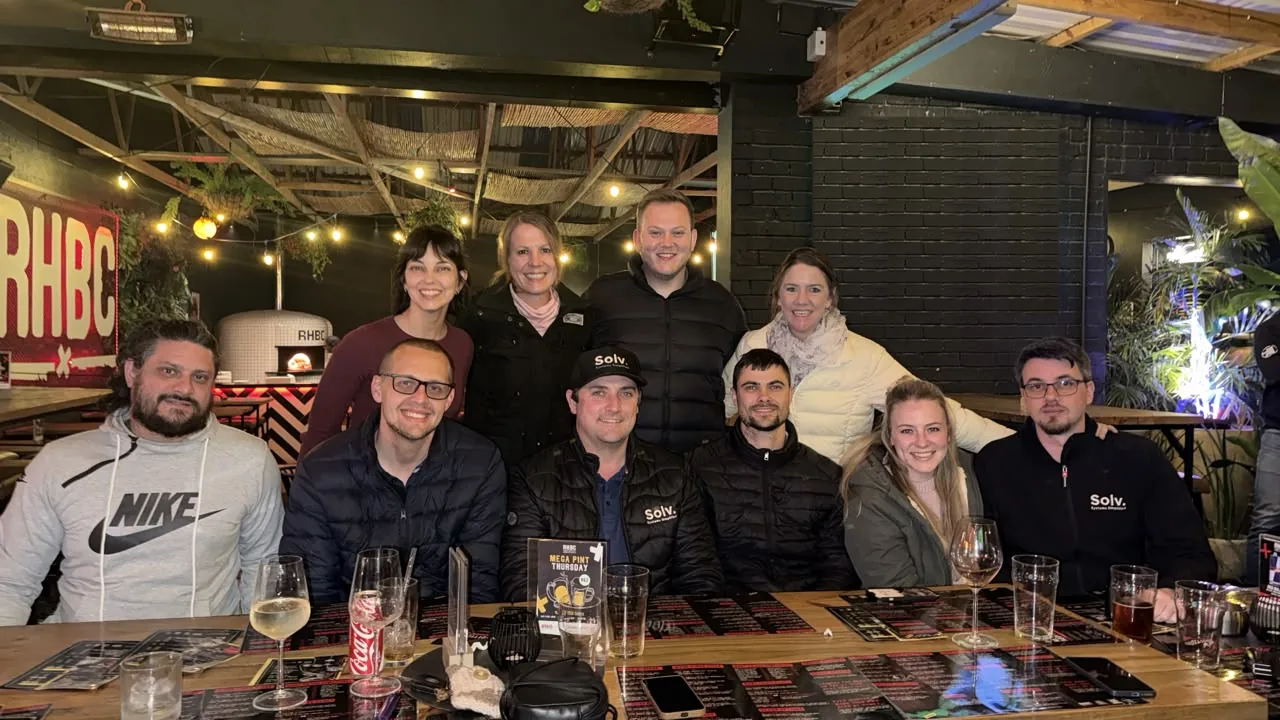 Solv Systems team members together at a team social evening